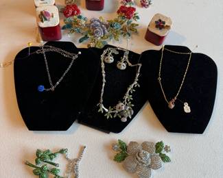 Small group of rhinestone costume jewelry and parts