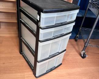 Black and clear plastic storage drawers, some wear, 25" x 13"