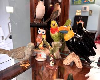 Grouping of bird figurines, resin, wood, and ceramic with owl, parrot, and tucan, tallest is 8"