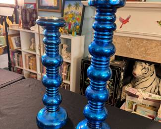 Pair of metallic blue pillar candle holders, tallest is 20"