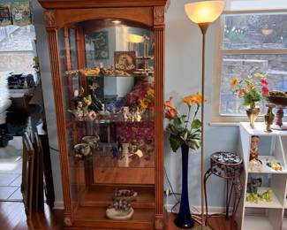 Tall lighted display cabinet with sliding front door (slides right) glass shelves have plate grooves, base molding shows some wear and chips, otherwise very nice 6'2"H x 36"W x 16"D