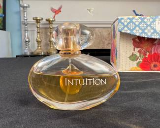 Intuition Estee Lauder 1.7 fl. oz. partially used perfume bottle 