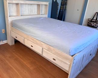 Discovery World Furniture full-size captains bed frame (no mattress) with bookshelf headboard, twin-size trundle, will require some disassembly of hex bolts, possibly some screws 