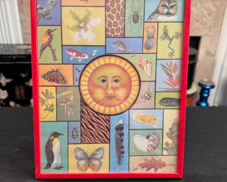 Small collage print of sun and nature by Linda Conner, red metal frame 8" x 11"