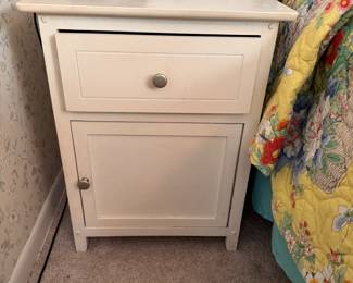 Offwhite side table with drawer and cupboard, lightweight, surface shows wear, especially on top 23"H x 19"W x 14"D