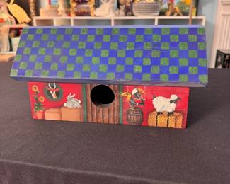 Red barn birdhouse (no bottom) with checkered roof, painted on both sides (likely by Linda Conner) 6"H x 12"L x 4"W