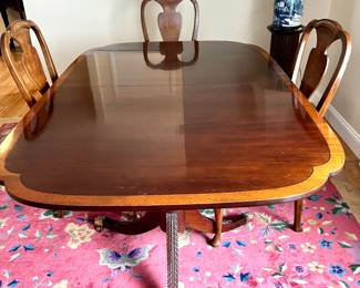Dining room table with 5 chairs, 2 arm chairs & 3 straight back
Table is 72 inches long, 46 inches wide & 29 inches tall 