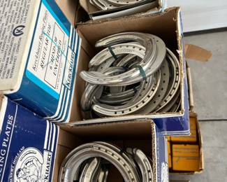 Large collection of aluminum race horse horseshoes