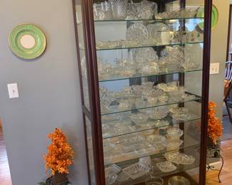 Hallway 
Large China cabinet-front slides open 
Pressed glass pieces