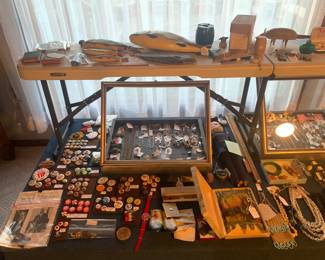 Living Room 
Case Table 
Political buttons, Sterling charm bracelets, candy fish containers 