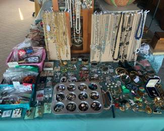 Living Room 
Costume Jewelry 4’ table full. Can not walk around with. Goes in numbered bin and will be delivered to Cashier when you’re ready to check out! 