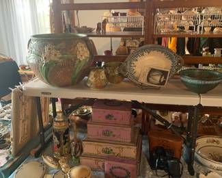 Living Room 
Jonquil by Roseville jardiniere & 2 other pieces. 
Chocolate tins by Louis Sherry
Celluloid deco Dresser set