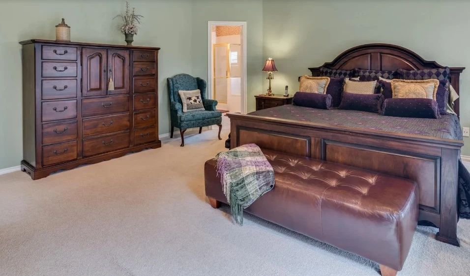 King-size bedroom suite:  Beautiful wood frame, mattress set, armoire, leather bench and Haberdashery Chest