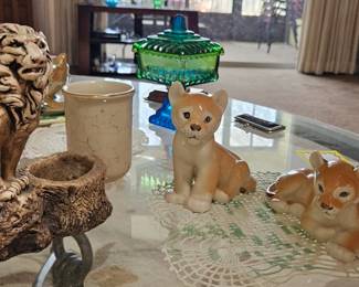 Cat figurines of all sizes