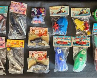 NOS lot of vintage space man toys, boats and rocket