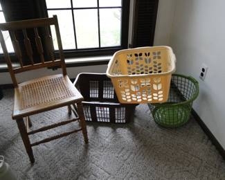 laundry baskets, and solid wood chair