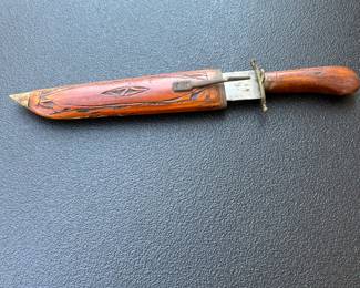 Knive with wood sheath