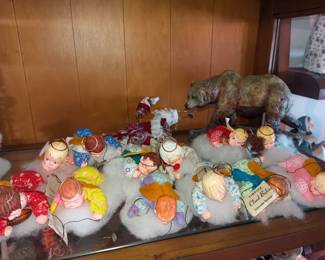 Cloud babies by Simpich blissfully unaware of the grizzly