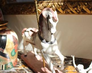 Ceramic horse on wood pedestal