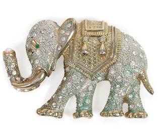 Lot 212
Huge Vintage gold tone and pave rhinestone figural Elephant Pin Brooch with pearl in trunk