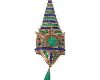 Lot 220
Boucher green and blue glass beaded figural gold tone mosque/stupa pin brooch with green glass drop and cabochon jewel.