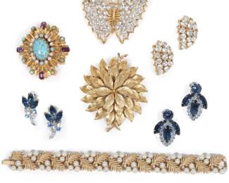 Lot 221
Group of costume jewelry including Lisner rhinestone butterfly brooch and matching earrings, Lisner turquoise art glass brooch, Lisner foliage brooch, Lisner blue rhinestone earrings, Crown Trifari faux pearl bracelet