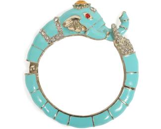 Lot 215
Enamel and rhinestone figural turquoise elephant hinged bracelet.