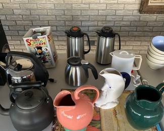 Russell Hobbs electric teapot, Calphalon teapot, Lindt Stymeist pottery. 