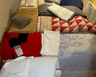 Collection of brand, new and gently used -King-size and Queen bedspreads. All freshly laundered.