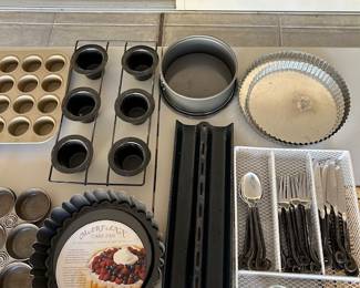 New and gently used housewares. Hand forged flatware set..