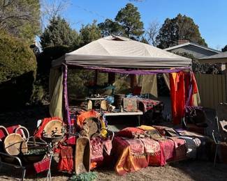 Antique, Vintage and brand New Textiles from around the world. Folk Art. Handmade pottery by local New Mexico artist. Carved wooden bowls and cast-iron candlestick holders.
