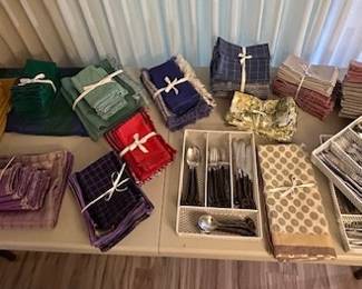 Brand new, never used collection of placemats and napkins. Two gorgeous sets handmade Indian Saris. 