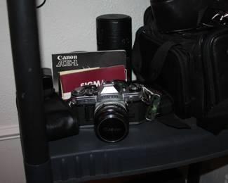 Canon AE-1 35mm camera with extra lens and bag