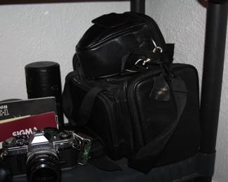 Canon AE-1 35mm camera with extra lens and bag