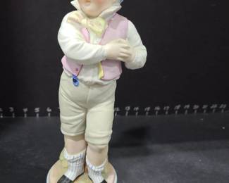 Bisque boy figurine 13 in. tall, numbered