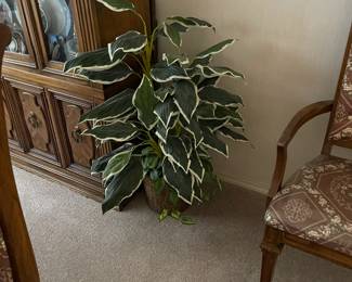 Artificial plants in pretty pots.