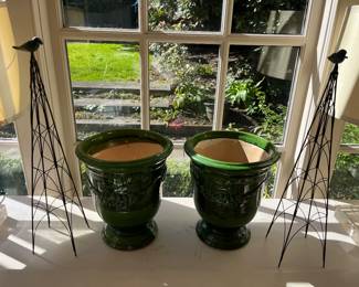 Pair of french urns and iron topiaries available during in-person sale Friday and Saturday.