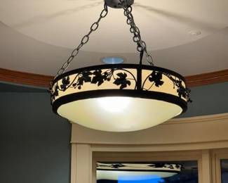 $280. Online purchase available starting at 9 am sharp until 4pm Thursday.  Click message icon for instructions.    Wrought iron and glass chandelier. Rim height is 4.5" X 22" dia. X 16.5" drop. Not onsite.  