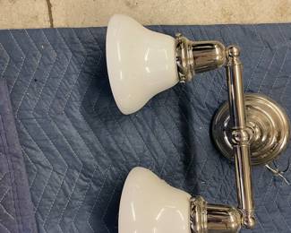$180.  Online purchase available starting at 9 am sharp until 4pm Thursday.  Click message icon for instructions.  Pair of art deco style nickel with white glass shade. 15:w X 7”d. Originally $640 for the pair. 