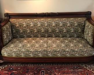 An important R. J. Horner & Co. carved mahogany Griffin sofa