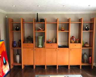 Large, but easy to break down, Contemporary shelving unit, more pieces go with it that were not utilized 