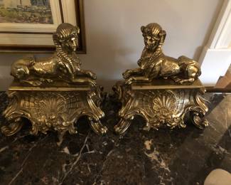 Pair of Sphinx brass chenet or fire dogs