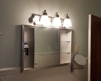 Vanity lights; mirrored medicine cabinet