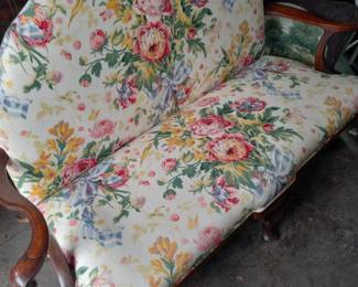 Floral upholstered bench.