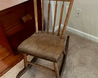 Wood rockers and other antique chairs