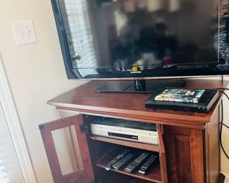 Large working television, tv stand, blue ray player etc!
