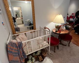 Vintage crib!  Parlor chairs, and lots of Christmas
