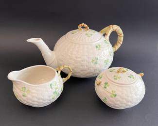 Belleek tea pot w/creamer and sugar bowels.