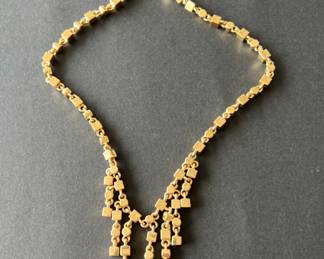 Costume gold necklace.