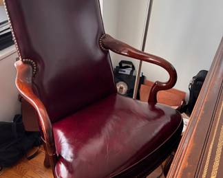 Queen Anne style leather chair.